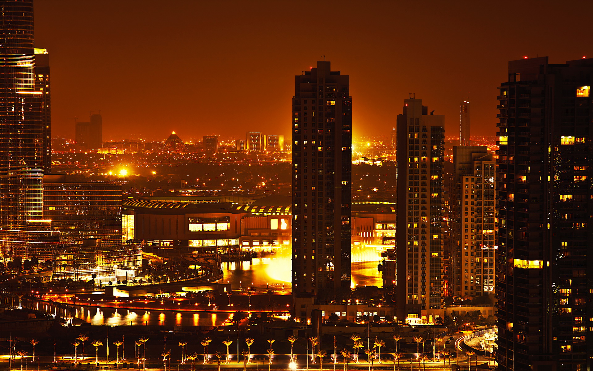 Dubai downtown night scene with city lights, luxury new high tech town in middle East, United Arab Emirates architecture